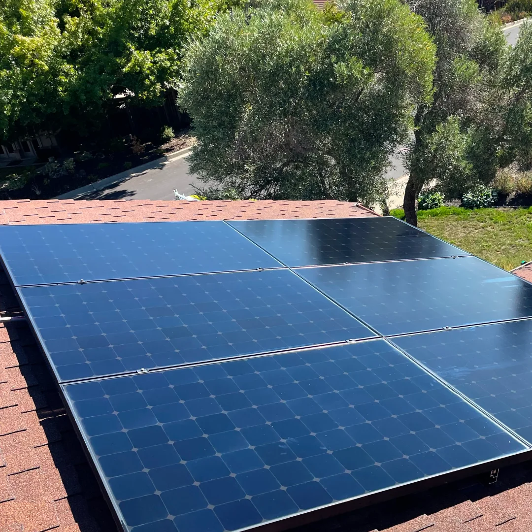 Solar panel cleaning service for Danville home with visible improvement in panel reflectivity